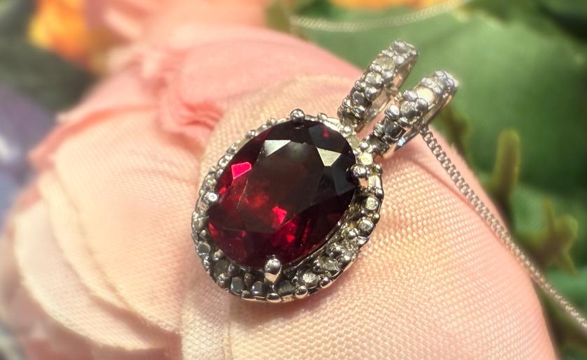 A ruby pendant on a chain