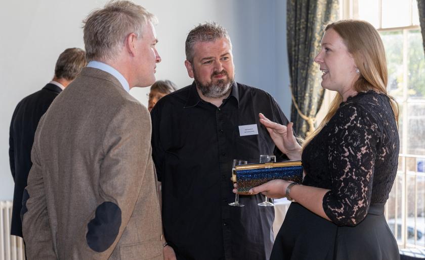 Danny Kruger MP with Julia's House parents Jenna and Luke