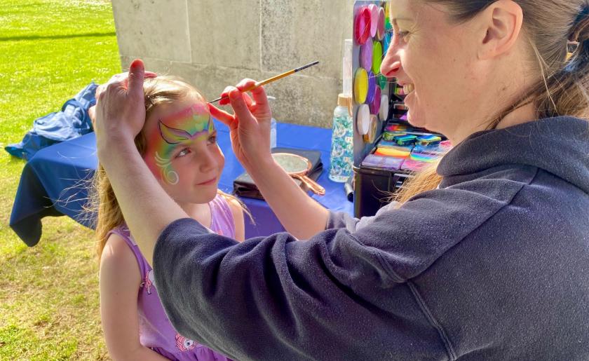Rosie has her face painted at Julia's House Easter trail