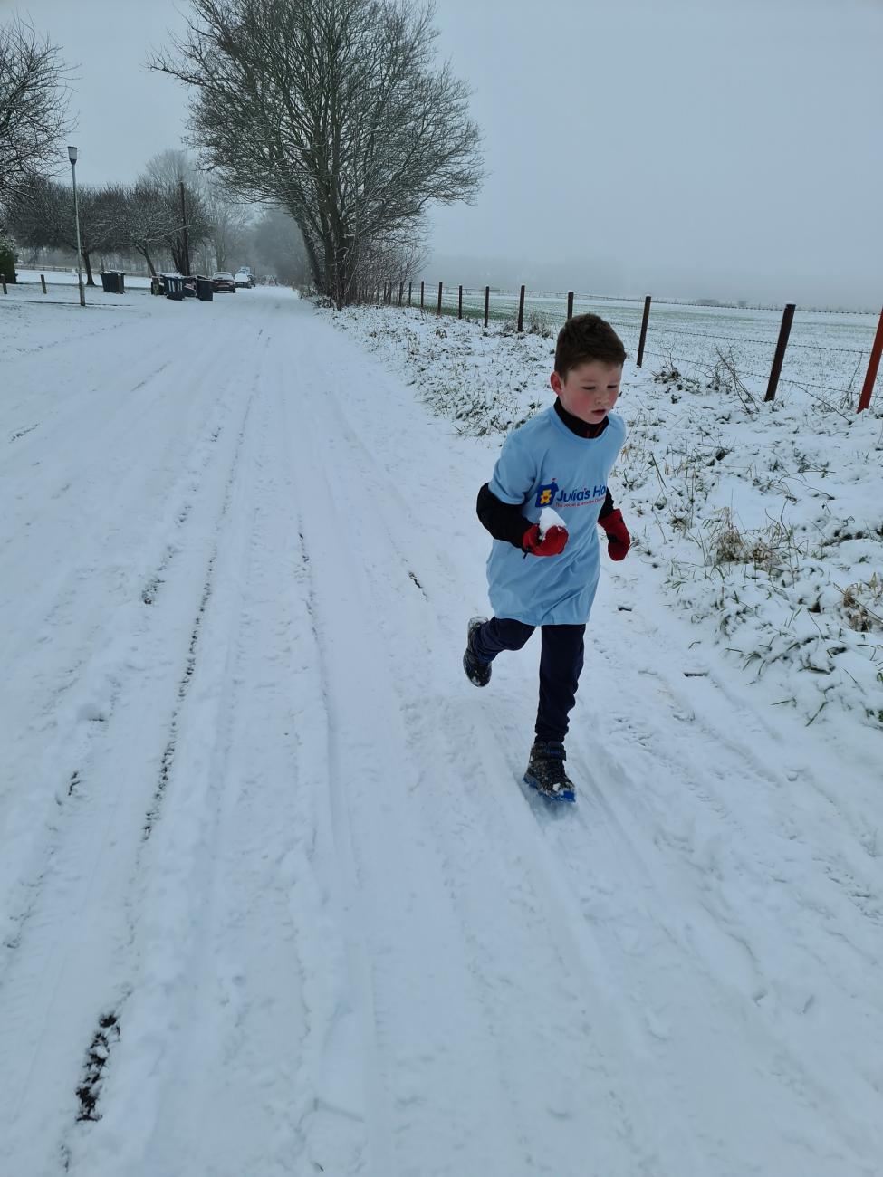 Harry runs in the snow for Julia's House