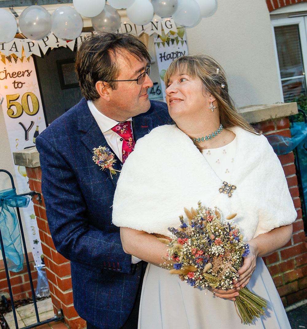 Laura and Guy celebrating their wedding day