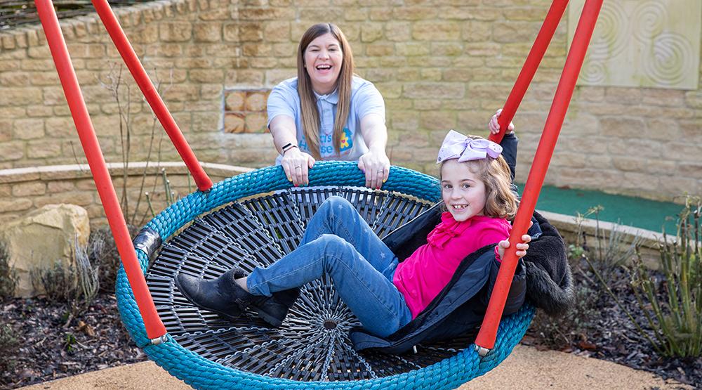 Evie with Julia's House sibling worker Tracey