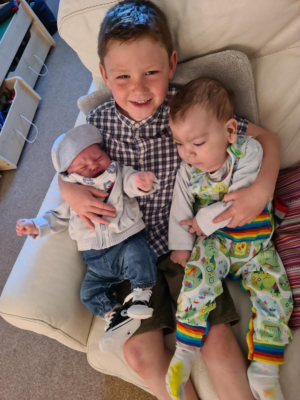 Harry with baby brother Felix and little brother Reuben