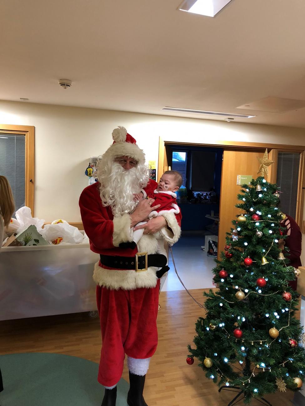 Baby Isabella with Father Christmas in Salisbury Hospital