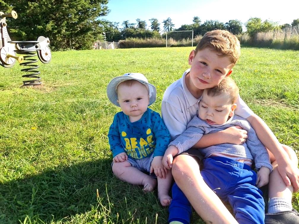 Big brother Harry with Reuben and Felix