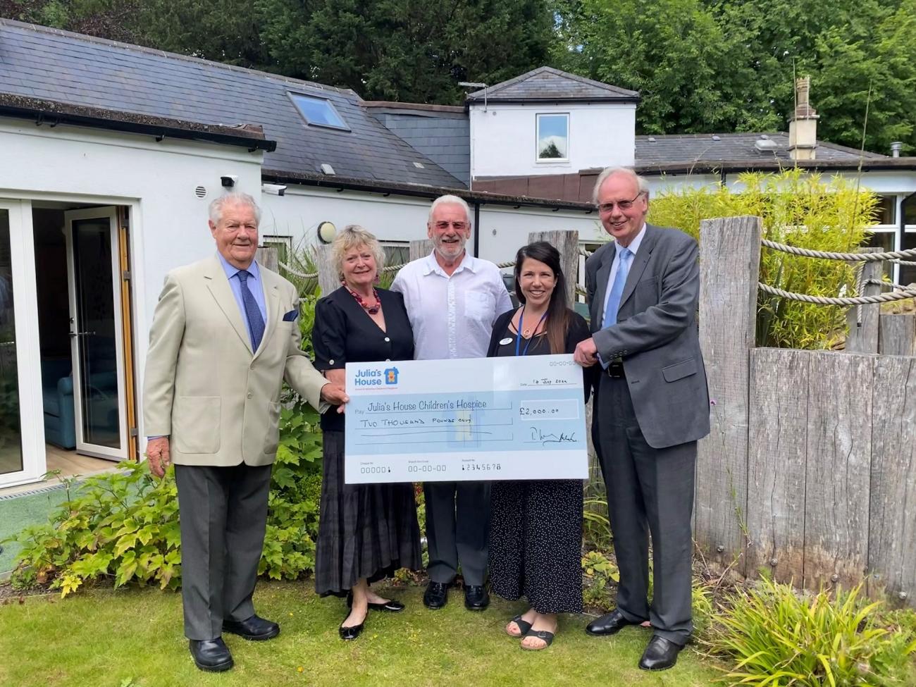 (L-R) Tim Lacy-Hulbert, Julia's House Vice Chair Peter Wragg and wife Jane, Senior Nurse Carys Wilkins and Mike Sanders