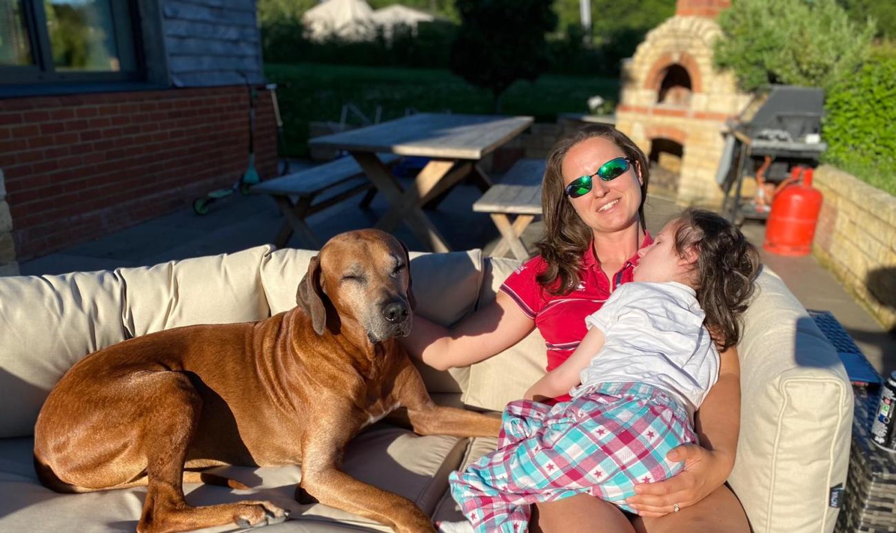 Sophia Thursby with mum Rebecca and dog Odin