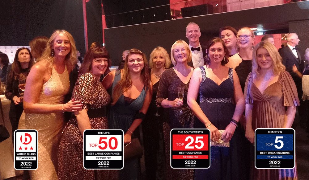 Julia's House team smiling at the Best Companies awards