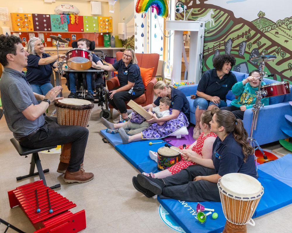 A group of children playing musical instruments