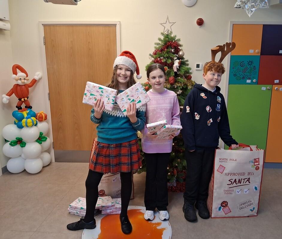 St Joseph's School delivering presents