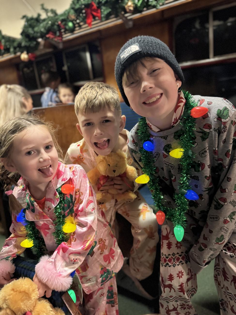 Skye with her brothers enjoying Christmas