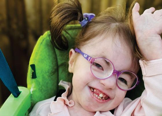 Ella, the 'little miracle' giggling in a swing