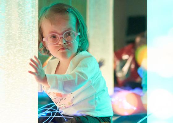 Isla, enjoying a session in the sensory room at Julia's House Childrens Hospice